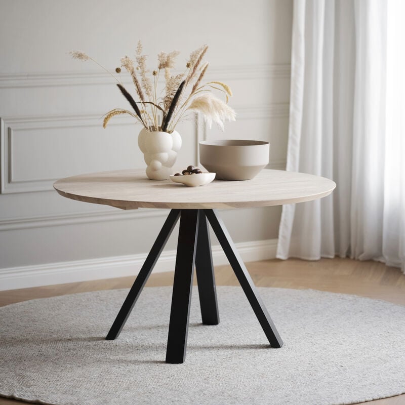 Rowico Home Carradale pyöreä ruokapöytä Ø 130 cm valkopesty/musta V-jaloilla