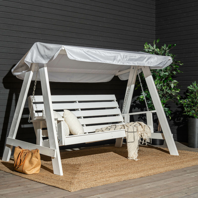 Saaristo pihakeinu katoksella valkoinen